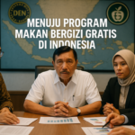 alt_text: "Poster program makan bergizi, menjanjikan banyak namun persiapannya tampak kurang matang."